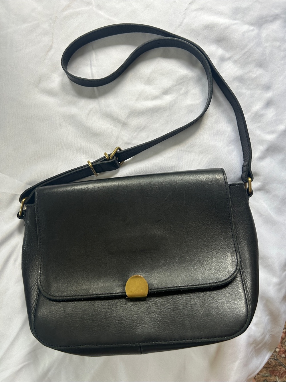 Classic Black Leather Crossbody Bag with Gold Accent